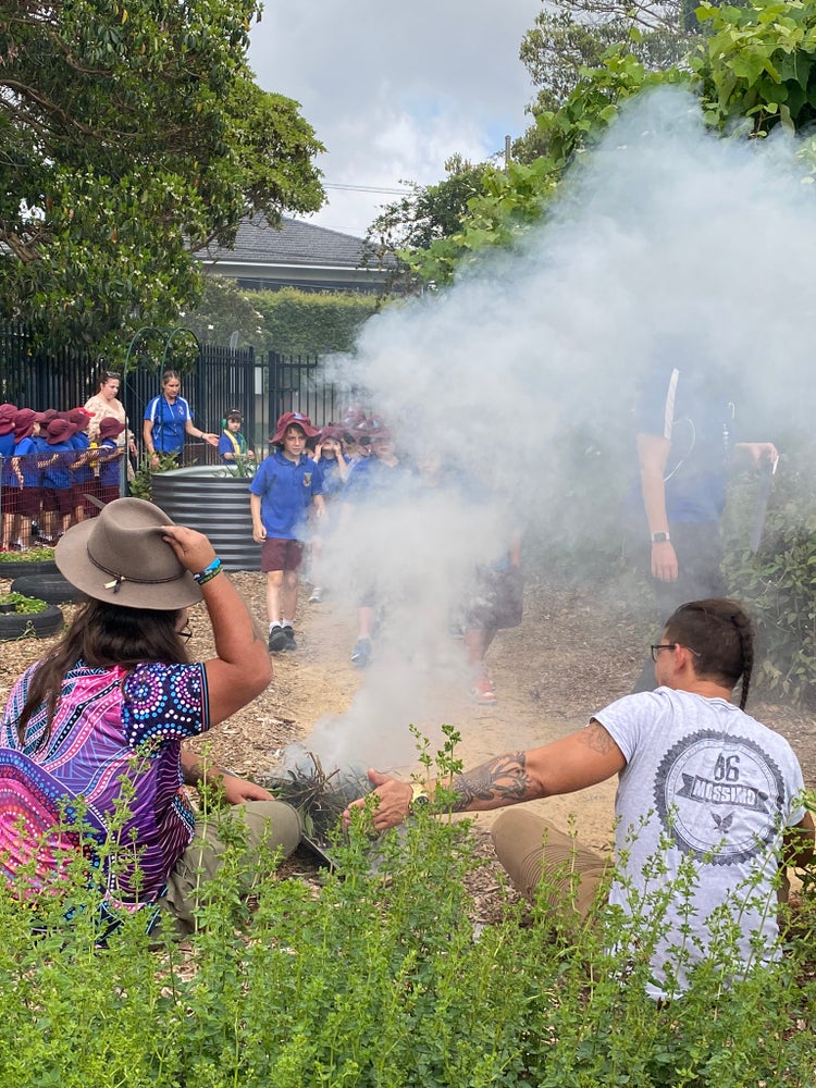 Photo of vegetable garden with smoking ceremony